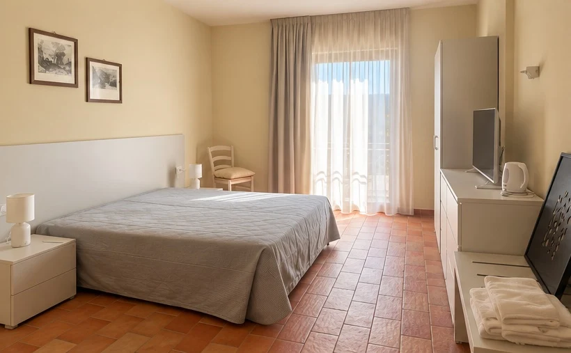 Camera Bellavista 24 con letto matrimoniale e portafinestra, Bellavista Rooms Villasimius