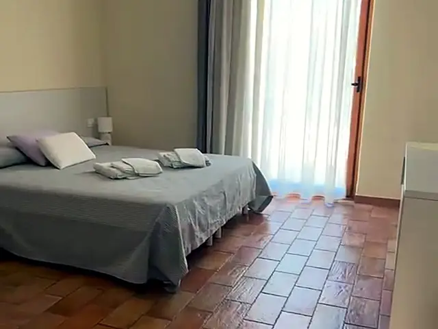 Camera Bellavista 25 con letto matrimoniale e portafinestra, Bellavista Rooms Villasimius